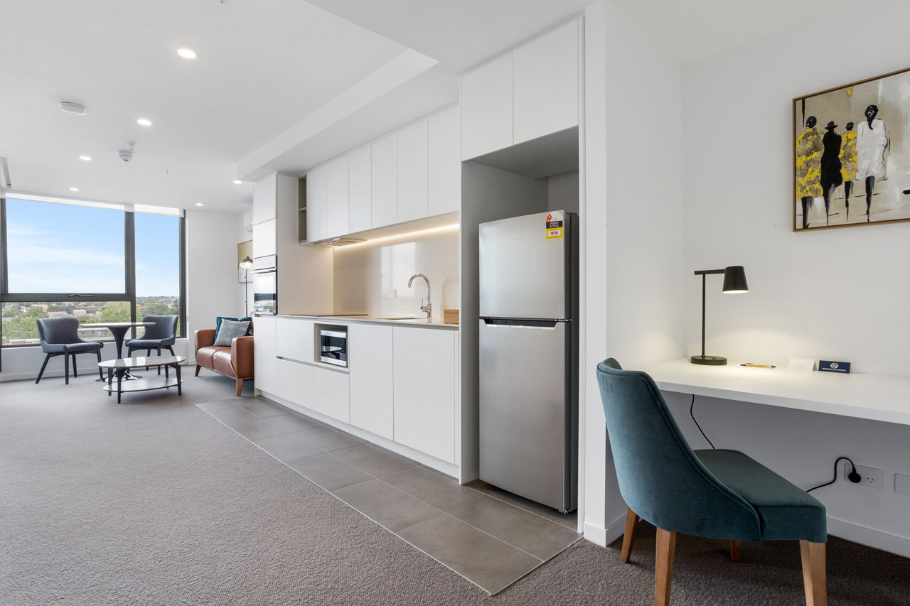 Kitchen and dining at The Sebel Moonee Ponds in 1 bedroom apartment with queen bed